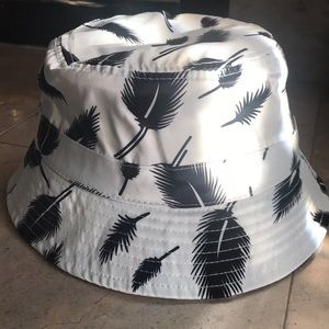 White with black feathers bucket hat
